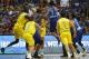 FILE - In this  July 2, 2018, file photo, Philippines' Jason William (7) jumps to hit Australia's Daniel Kickert, center left, as others rush to break a brawl during the FIBA World Cup qualifying basketball game at the Philippine Arena in suburban Bocaue township, Bulacan province, north of Manila, Philippines. Kickert was given a five-match ban for unsportsmanlike behavior by international body FIBA on Thursday, July 19, 2018, for his part in a brawl during an Asian qualifier against the Philippines for the 2019 World Cup. (AP Photo/Bullit Marquez, File)