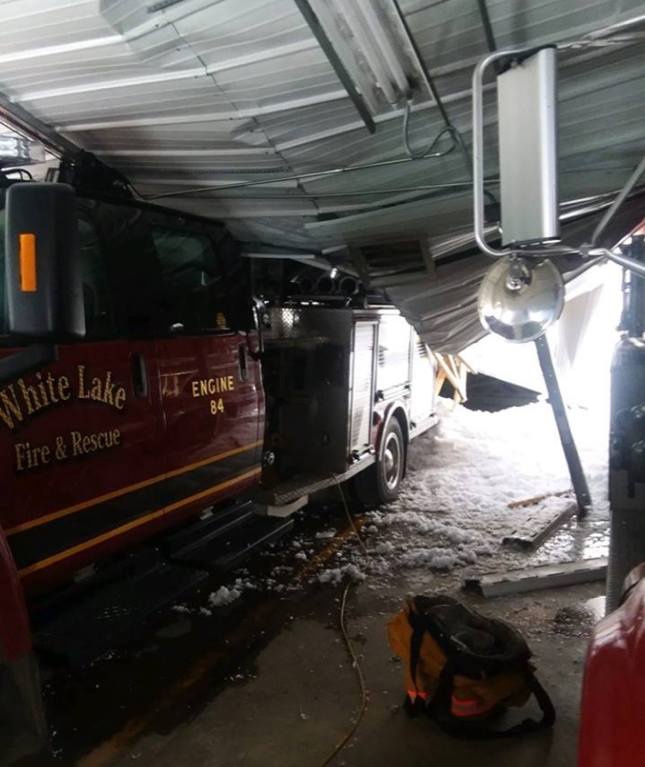 'Trapped! White Lake's fire department truck under a roof and snow from a late 2019 storm.