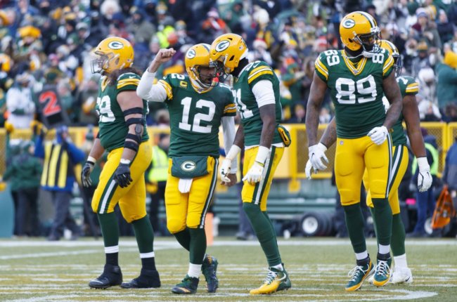 Packers QB Aaron Rodgers and WR Davante Adams celebrate together