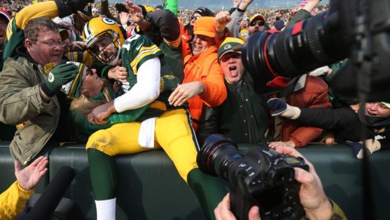 Green Bay Packers quarterback Aaron Rodgers (12) celebrated his second quarter rushing touchdown with fans at Lambeau Field Saturday December 24,2016 in Green Bay, Wis. ] The Green Bay Packers hosted the Minnesota Vikings at Lambeau Field. Jerry Holt / je