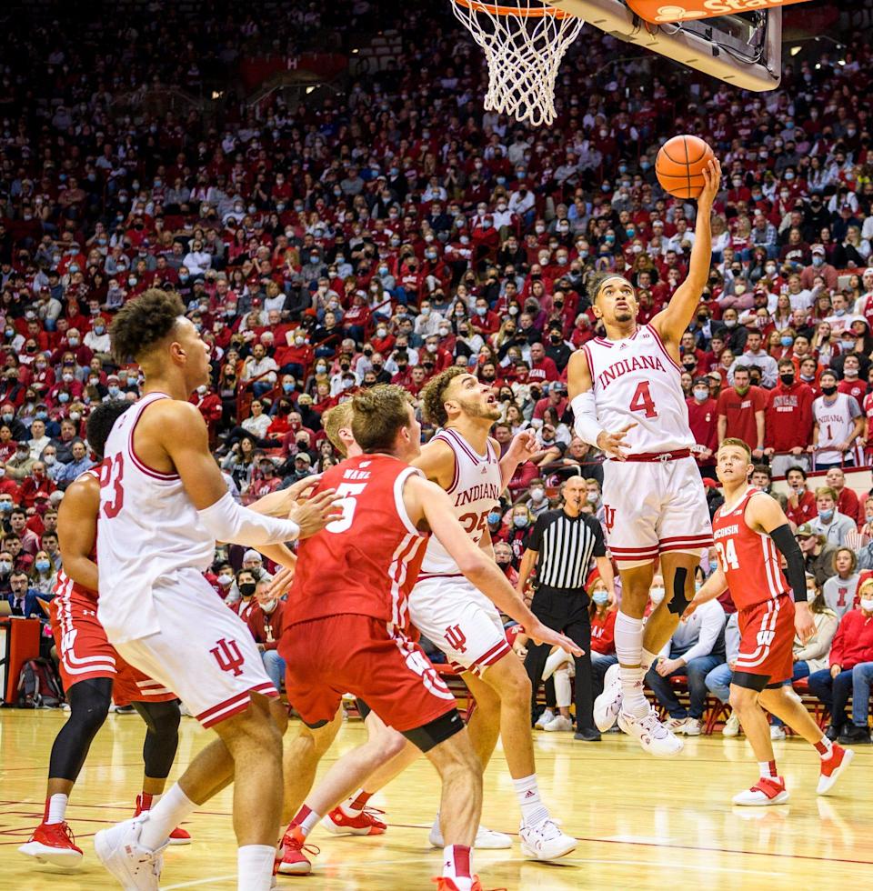 Indiana&#39;s Khristian Lander (4) shoots during the first half of the Indiana versus Wisconsin men&#39;s basketball game at Simon Skjodt Assembly Hall on Tuesday, Feb. 15, 2022.