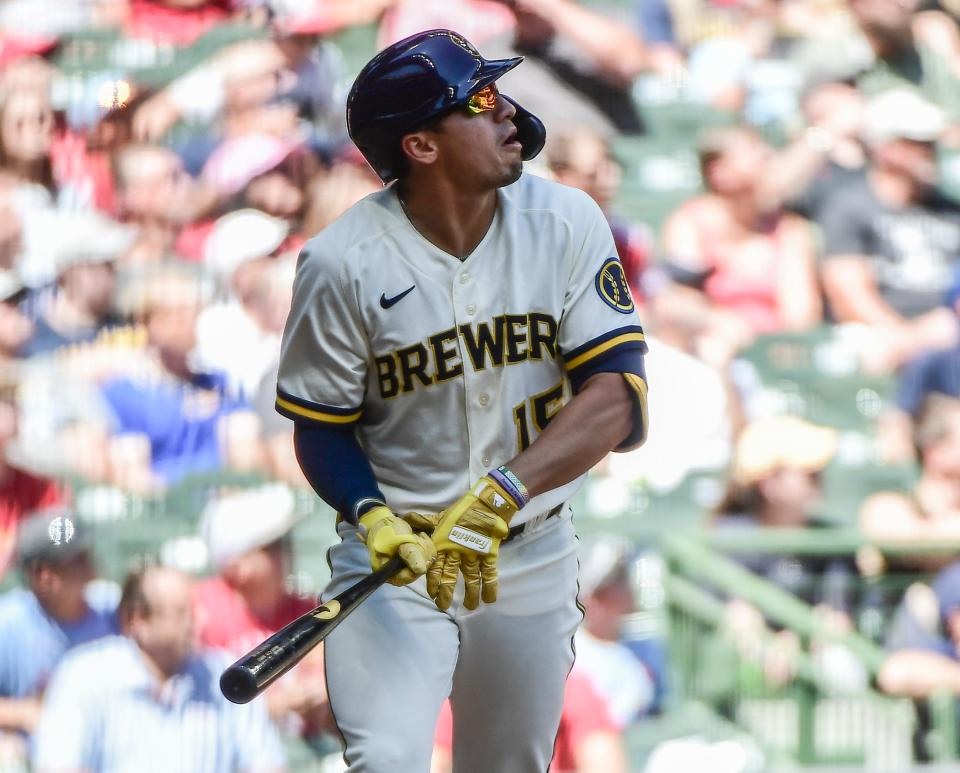 Jun 23, 2022; Milwaukee, Wisconsin, USA; Milwaukee Brewers right fielder Tyrone Taylor (15) watches after hitting a 3-run home run in the fourth inning against the St. Louis Cardinals at American Family Field. Mandatory Credit: Benny Sieu-USA TODAY Sports