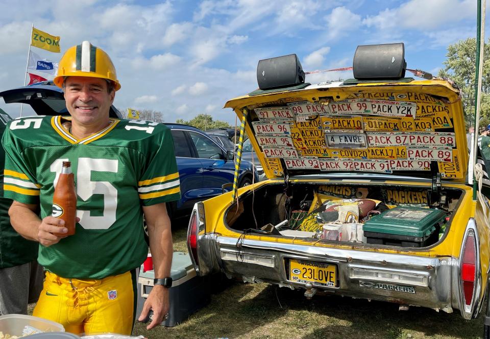Bart Boyden of Pittsfield and his 1972 Cadillac Fleetwood have been tailgating together outside Lambeau Field since 1990. As is his tradition, Boyden wore his Packers uniform, shoulder pads and all,  for the home opener on Sunday.