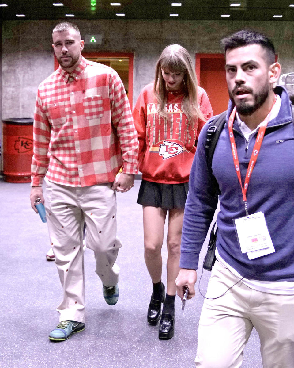 Taylor Swift and Travis Kelce at Chiefs-Chargers game in Kansas City on Oct. 22 (Charlie Riedel / AP)