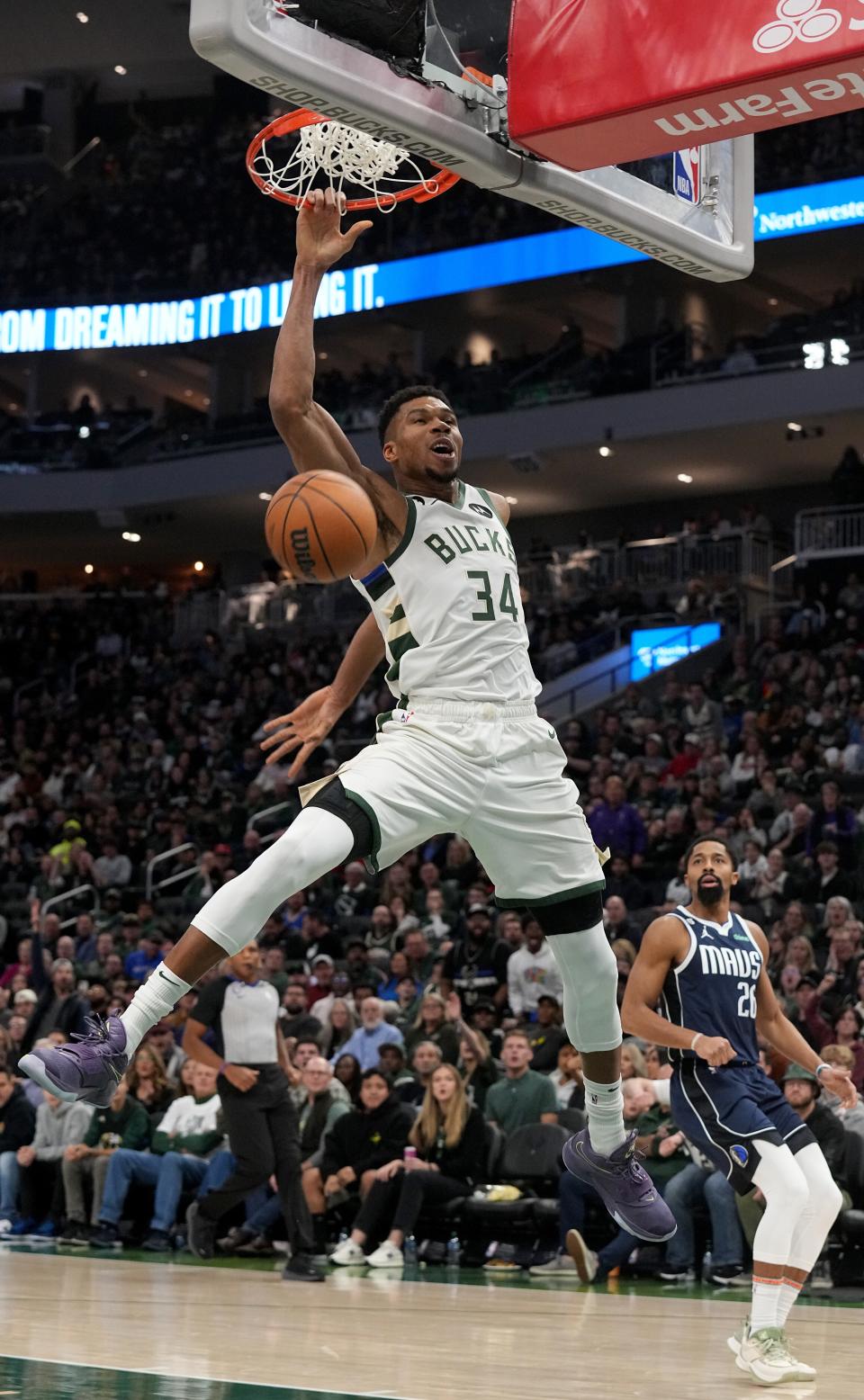 Milwaukee Bucks forward Giannis Antetokounmpo (34) throws down a dunk during the second half of their game Sunday, November 27, 2022 at Fiserv Forum in Milwaukee, Wis. The Milwaukee Bucks beat the Dallas Mavericks 124-115.